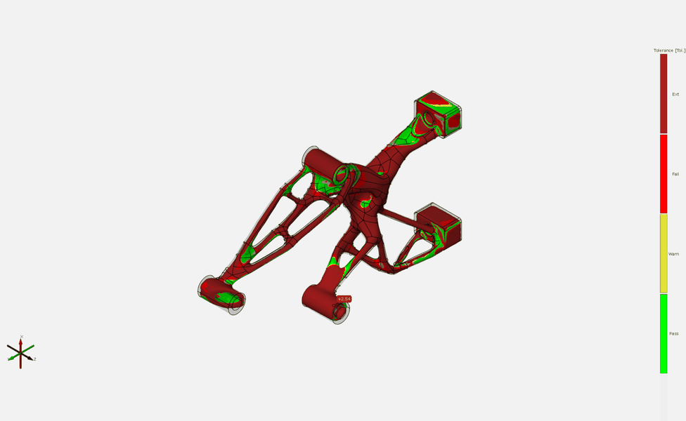 The same scan comparison rendered as Pass/Warn/Fail/Extreme bands against a ±0.2 mm tolerance: almost the whole part reads dark-red 'extreme', with only isolated green patches passing