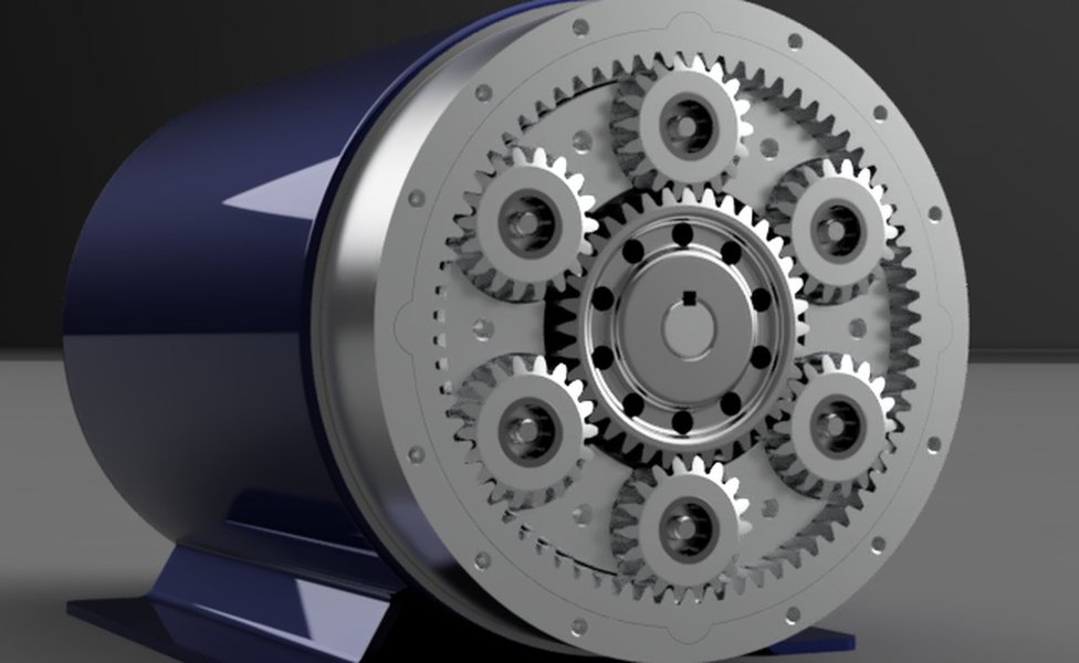 CAD render of the second-generation planetary gearbox mounted on the face of an electric motor with its cover removed, showing six planet gears spaced evenly around a central sun gear inside the ring gear